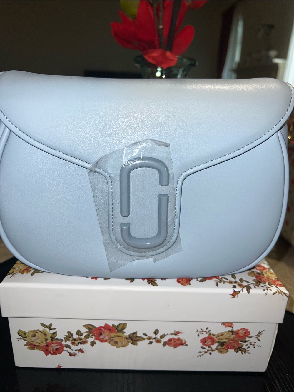Sleek Light Blue Women's Crossbody Bag with Metallic Accent